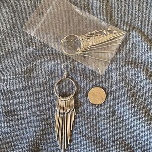 Dangly earrings. Never been worn